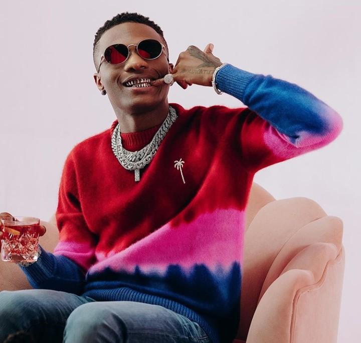 Moment some fans grabbed Wizkid leg on stage in Abuja (video) 3 Wizkid
