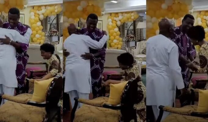 Bishop Oyedepo’s wife kneeling