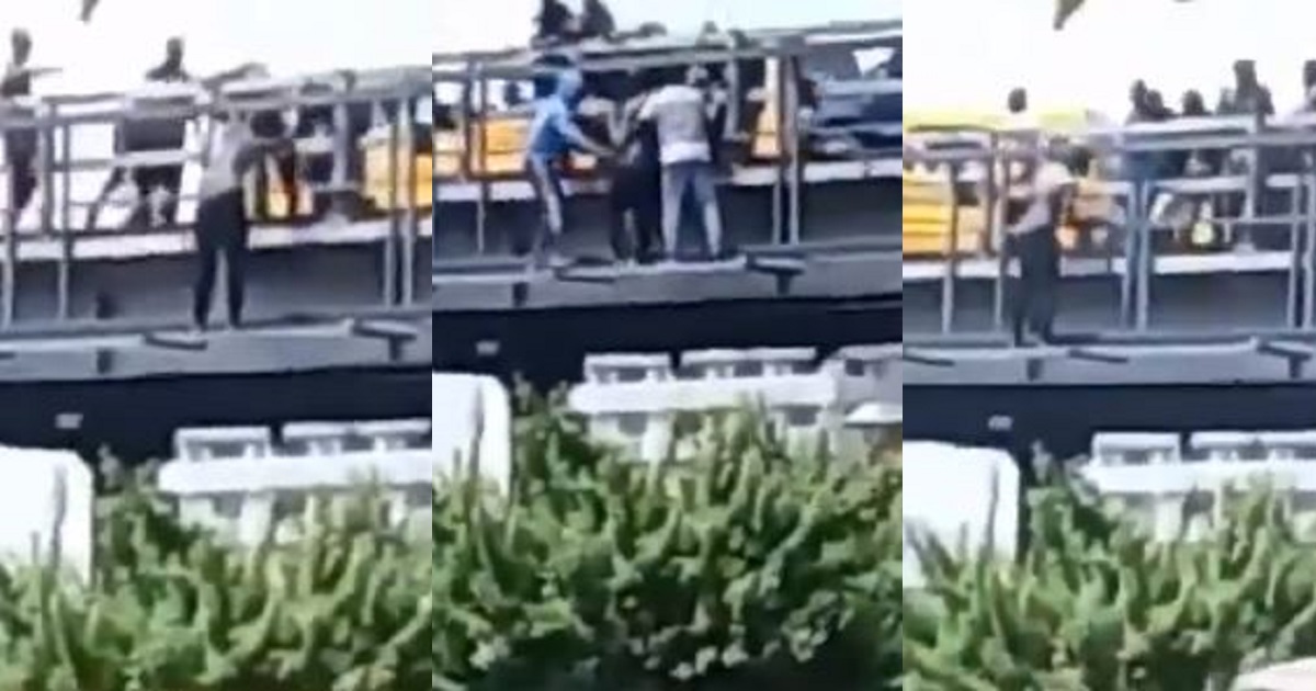 Nigerians prevent man from committing suicide on Jibowu Bridge in Lagos (video)