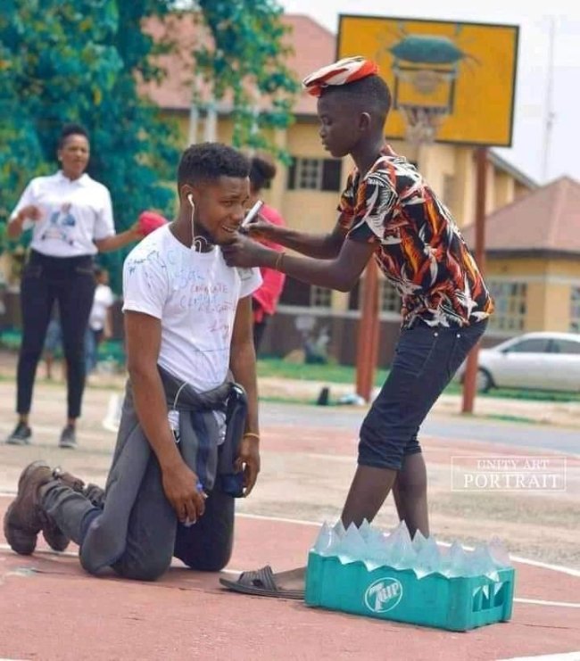 student knelt