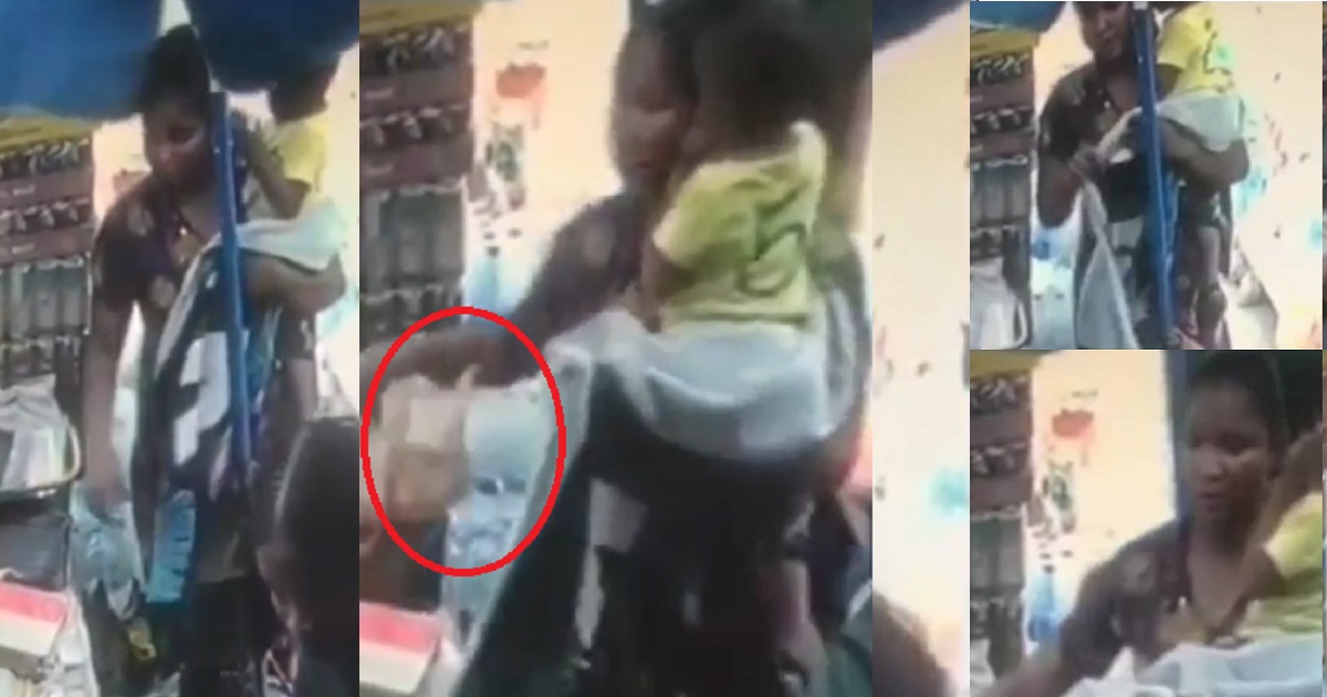 Nursing Mother pretending to be in search of a job caught on camera stealing a bag in a shop (video)