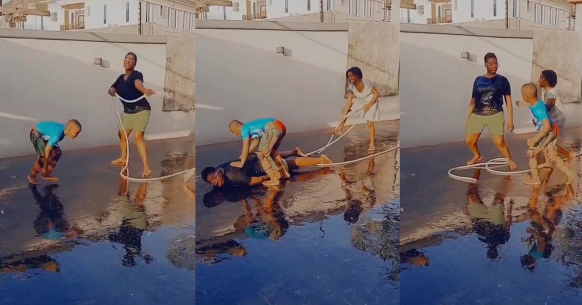 Fun mom, Mercy Johnson uses water hose as gun in a fun shooting session with her kids (WATCH)