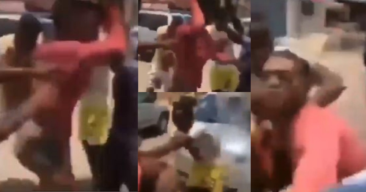 Angry Nigerian youths beat up a crossdresser (Video)