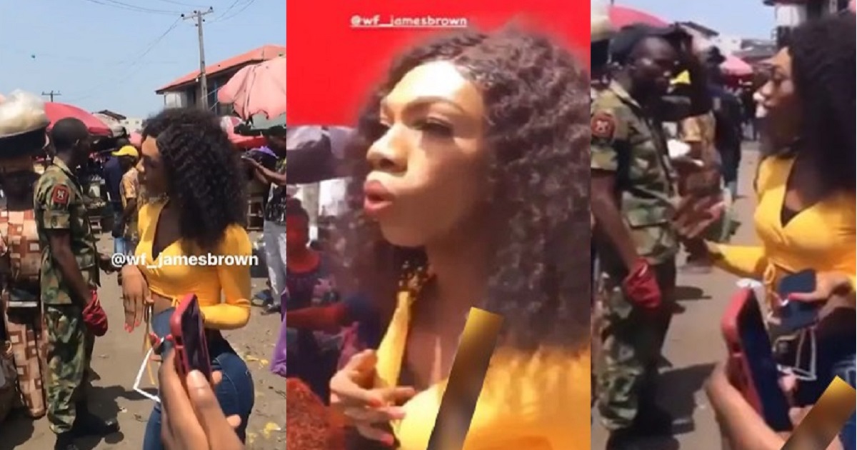 Crossdresser, James Brown storms market with military escort (Video)