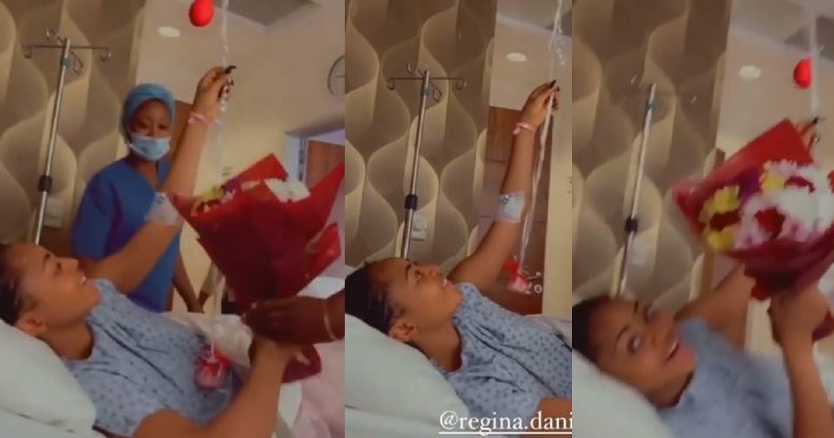 Regina Daniels receives flowers from co-wives as she undergoes surgery (Video)