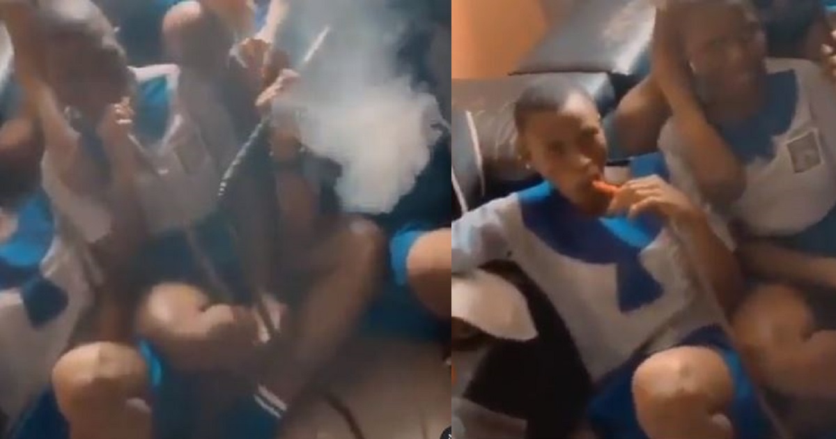 Disturbing video shows young school girls in their uniforms smoking shisha inside a sitting room