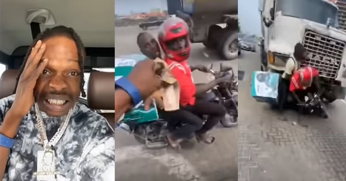 Dispatch rider almost crushed by truck while collecting money from Naira Marley (Video)