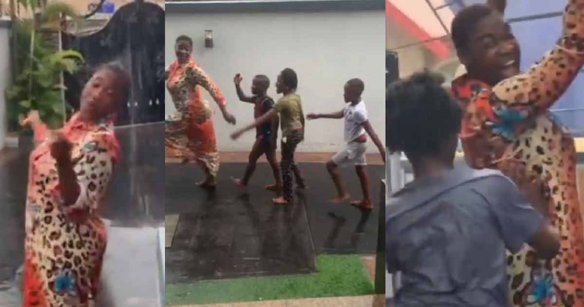 “Aunty who breaks the rule” – Mercy Johnson says as she plays in the rain with her family