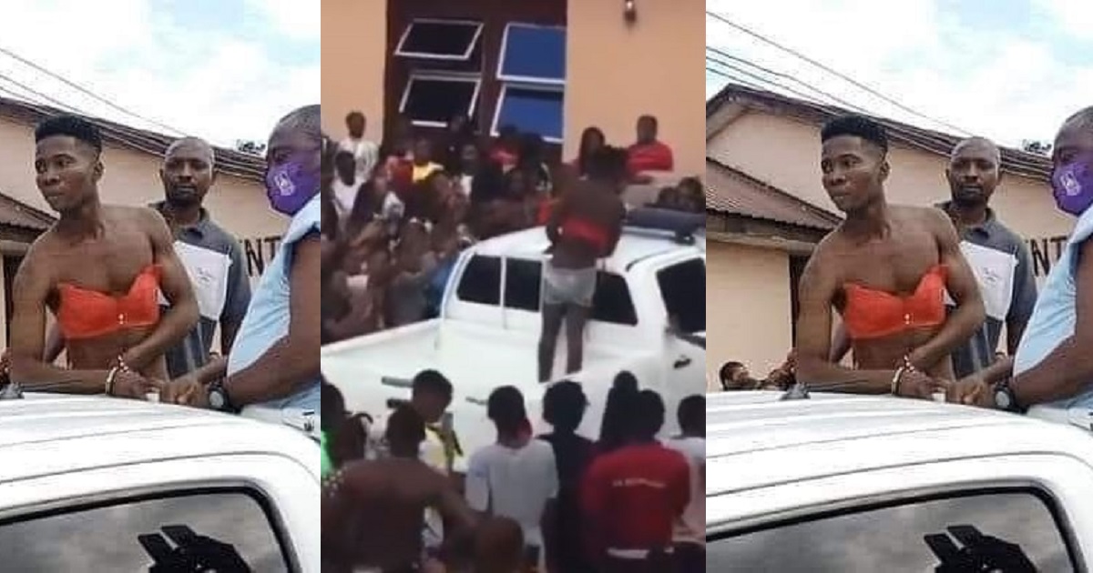 Man stripped and paraded after he disguised as a woman and snuck into female hostel in Ignatius Ajuru University of Education (video)