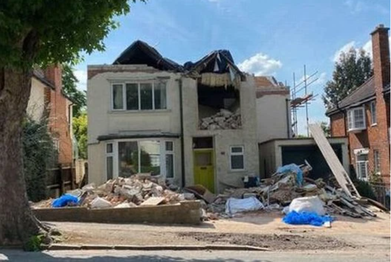 Builder breaks down house