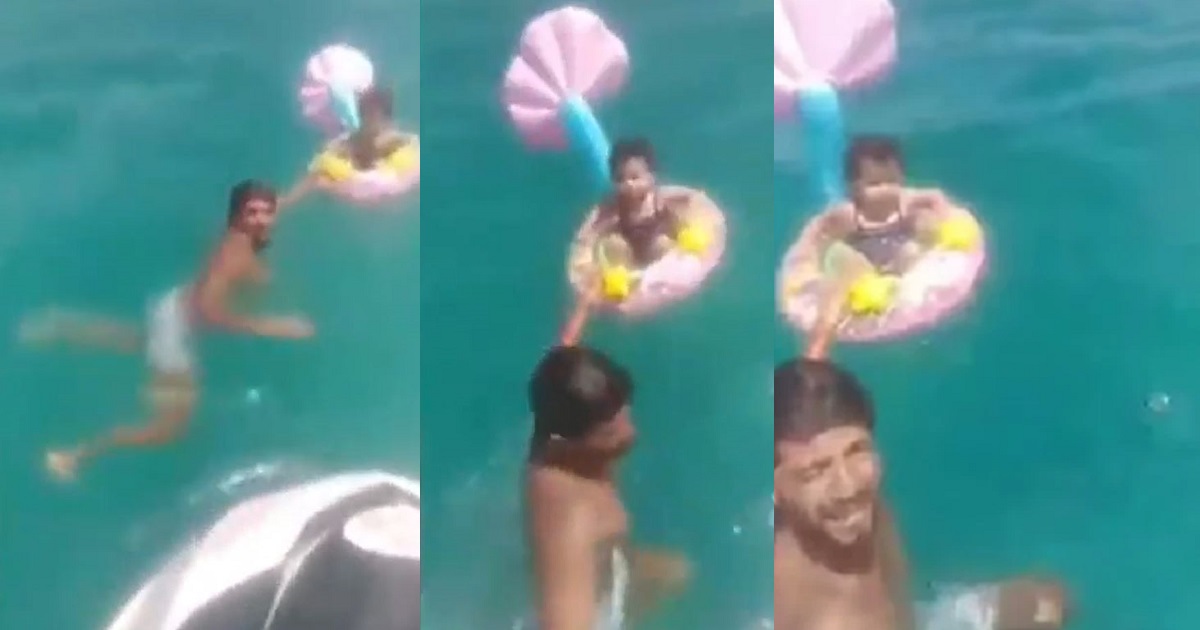 Baby girl rescued after floating a mile out to sea on rubber ring on Tunisia beach (Video)