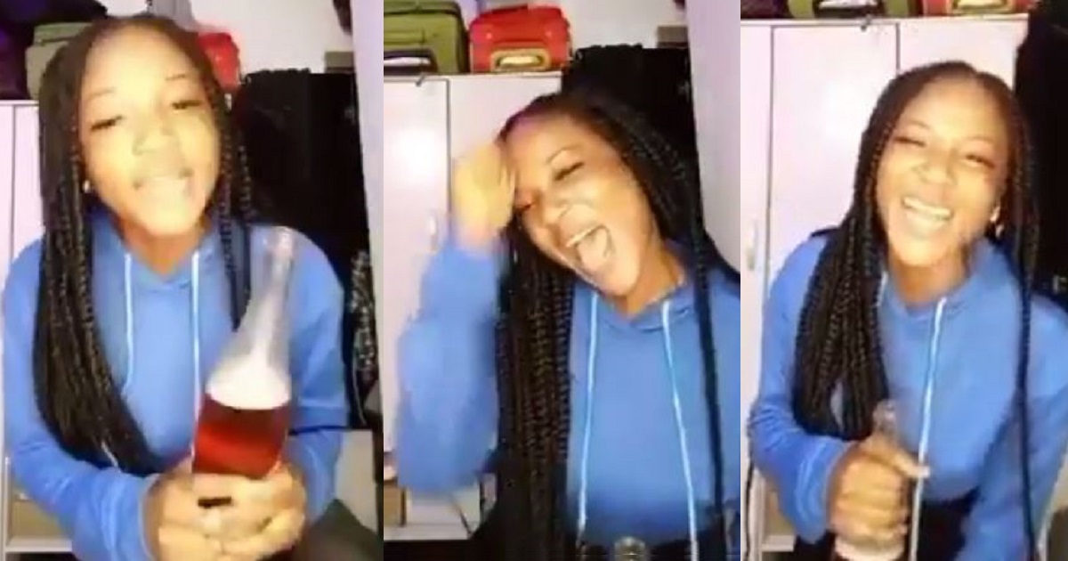 Lady celebrates with wine and music after seeing her period (Video)