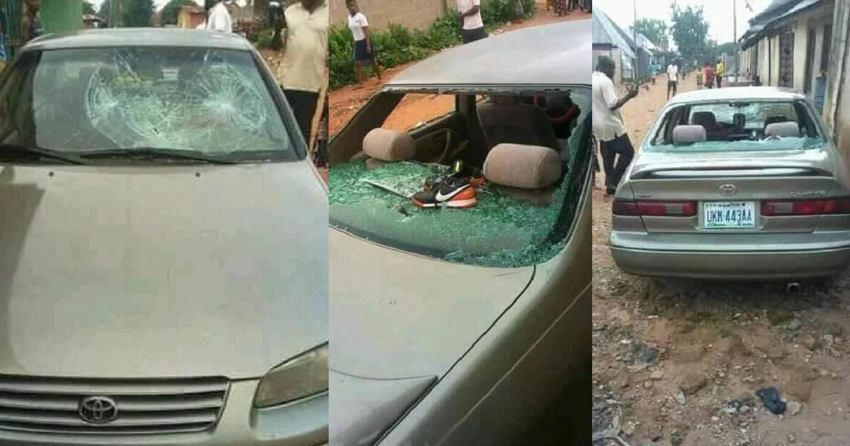 Two married men allegedly fight in public over a woman in Benue, destroy car