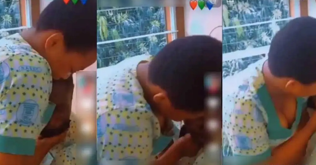 Female high school student caught on camera forcing her male classmate to kiss her during school hours (WATCH)