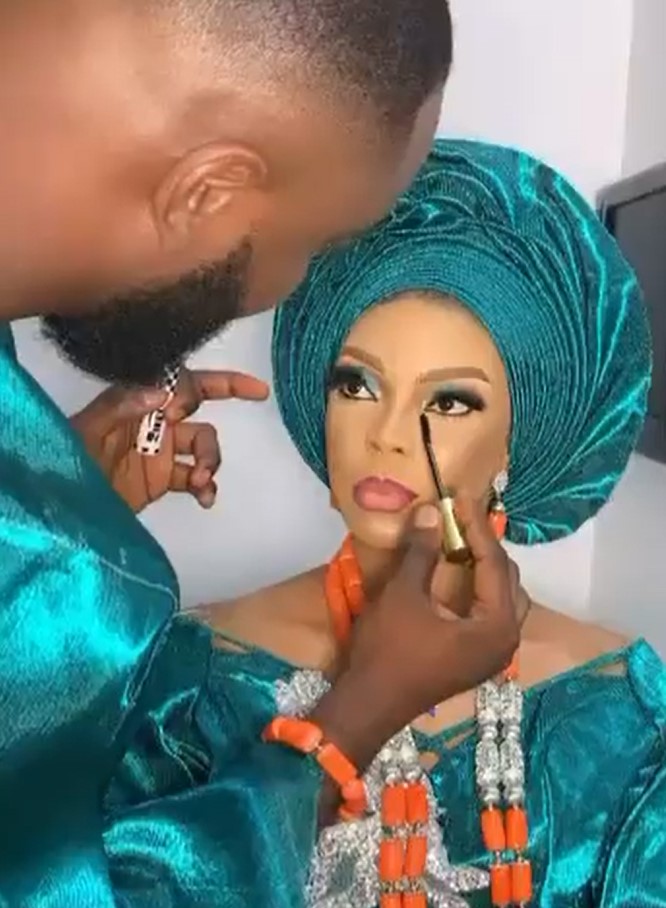 Nigerian groom melts hearts online after he was spotted doing his bride’s makeup on their wedding day (Photos) 5 groom of the year2