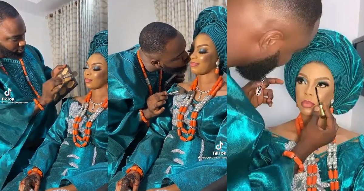 Nigerian groom melts hearts online after he was spotted doing his bride’s makeup on their wedding day (Video)