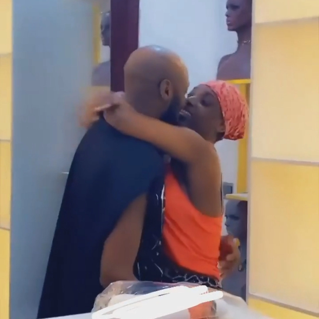 Actress, Annie Idibia jumps on husband Tuface and kisses him as he pays her a visit at work (WATCH)