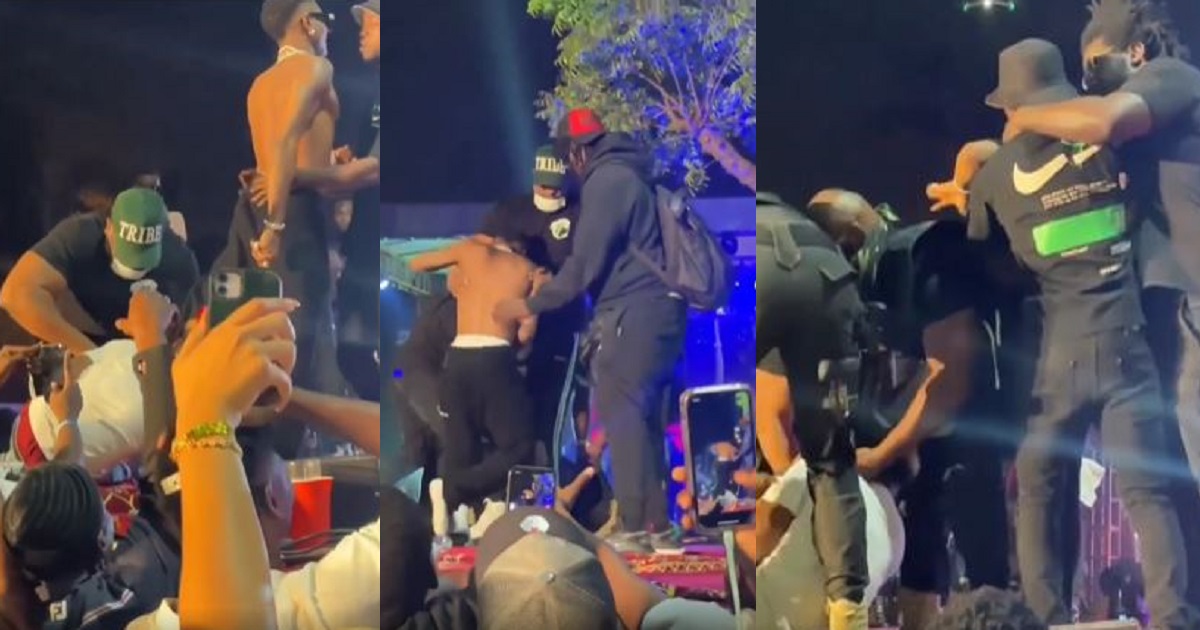 Moment some fans grabbed Wizkid’s leg on stage in Abuja (video)