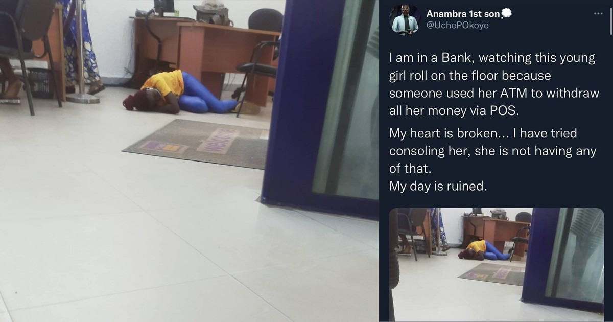 Man shares photo of a lady who was rolling on the floor of a bank after someone used her ATM to withdraw all her money through a POS