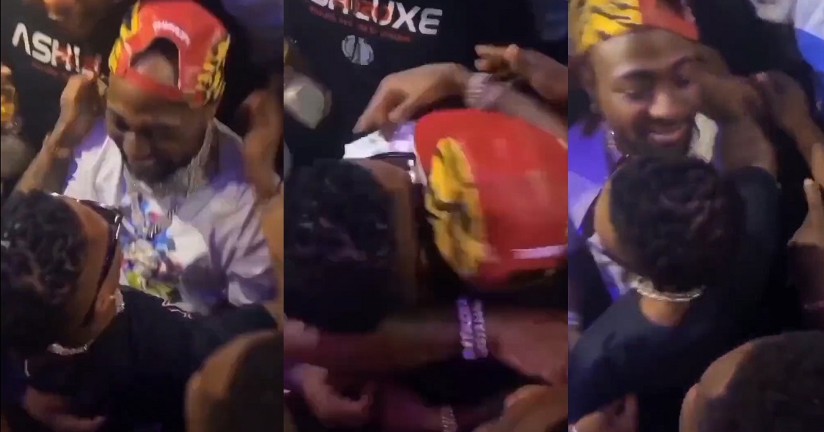 Fans excited after Wizkid and Davido hugged each other at a club last night (Video)