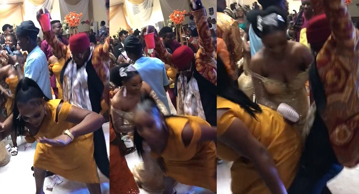 Moment a bride chased off bridesmaid twerking on her groom’s best-man at their wedding reception (Video)