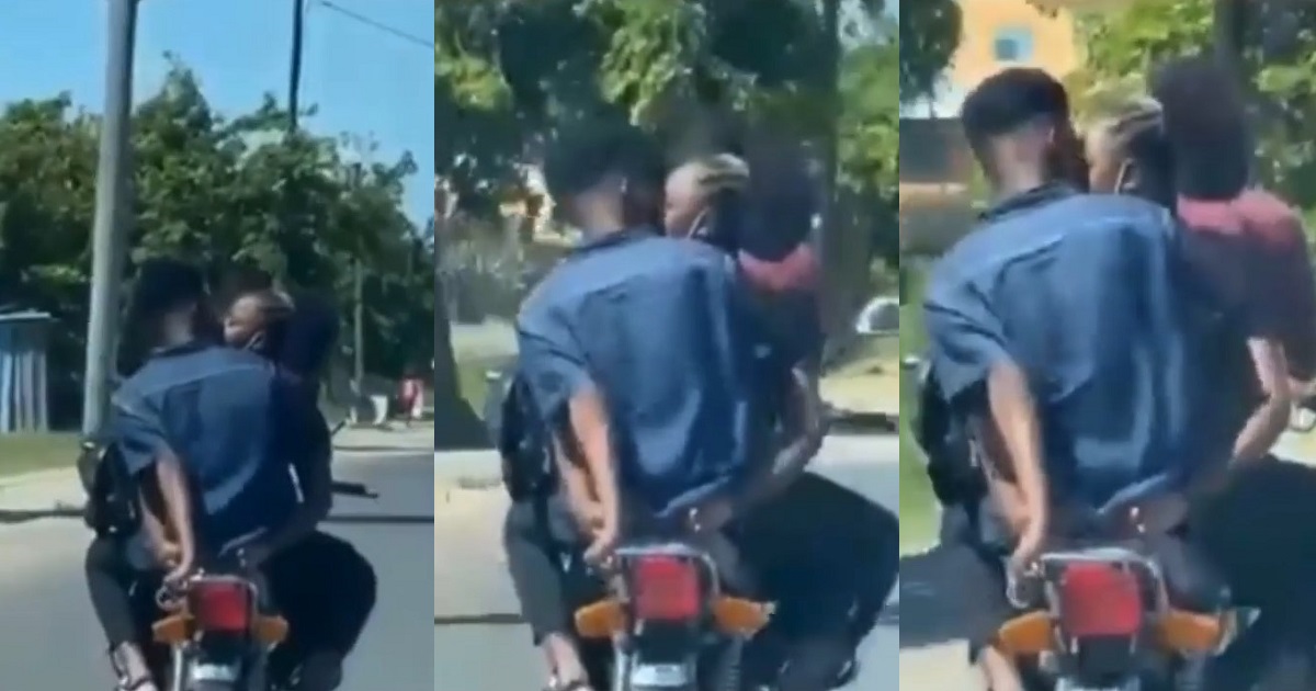 Couple spotted locking lips on a moving motorcycle (Video)