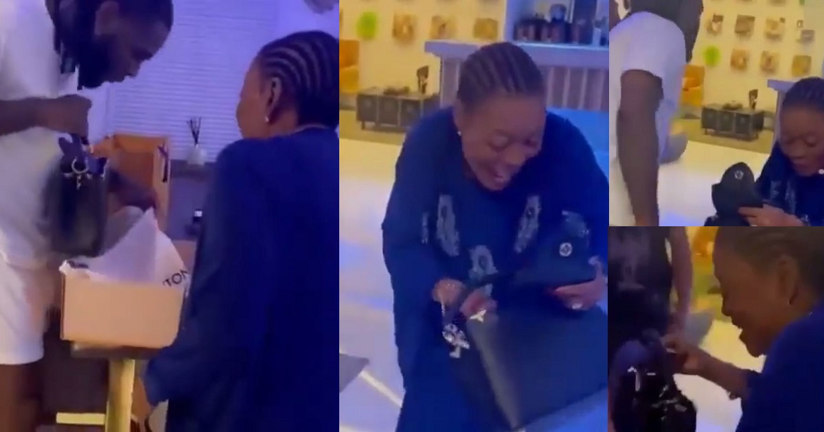 Heartwarming moment Burna Boy’s grandma sings his song in excitement as he gifts her a Louis Vuitton $6K handbag (video)