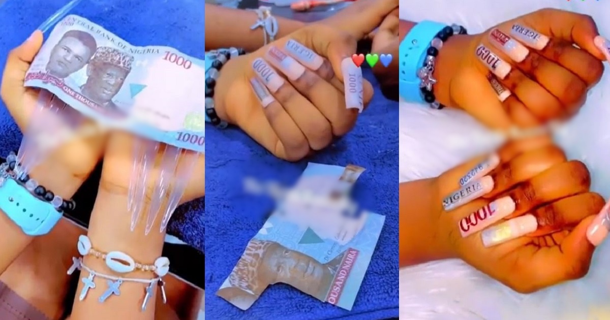 Nigerian lady comes under heavy fire for using N1000 note to adorn her nails (video)