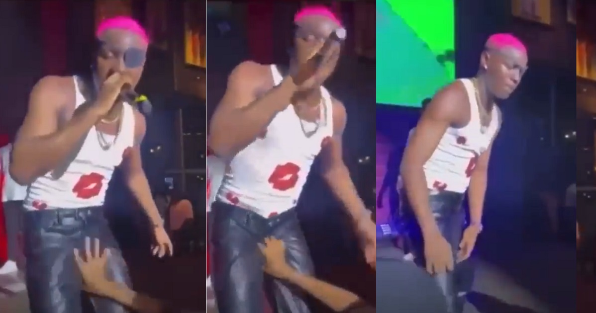 Shocking Moment a Lady groped Nigerian Singer, Ruger’s manhood on stage. (Video)