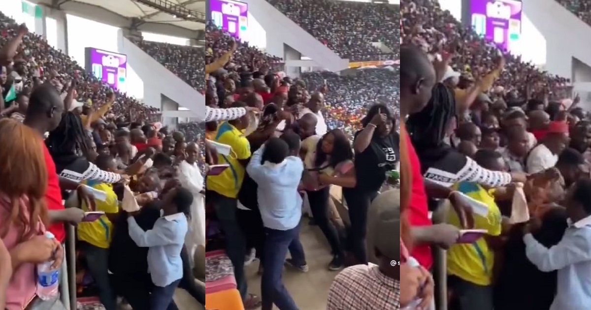 “Peace and unity in the mud” – Reactions as some Nigerians were spotted fighting while the Nigerian national anthem was being sung during World Cup qualifiers (video)