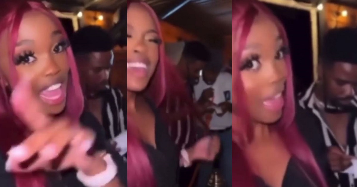 Lady continues partying as her man who was seemingly troubled with the bill they got at a club, tried to settle with the waiter (video)
