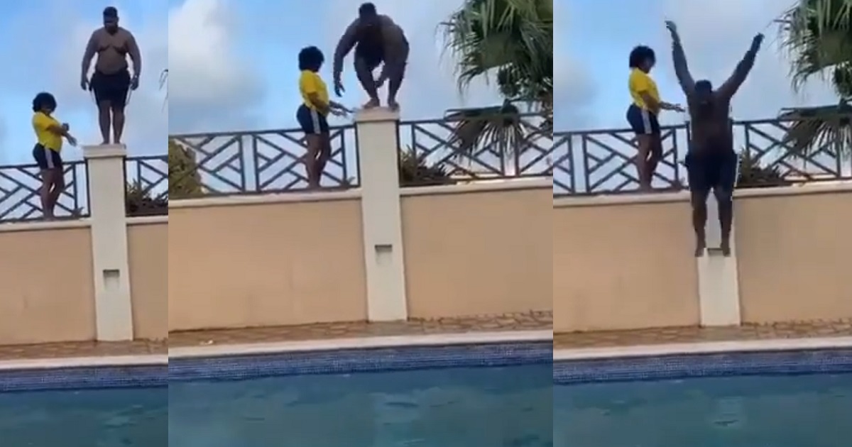Man seemingly trying to impress a lady lands awkwardly as he dives into a pool. (Video)