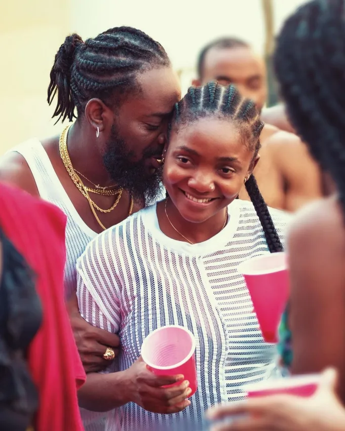 Romantic moment Adekunle Gold posed as a “superfan” to surprise his wife, Simi, with a cake during a live show (video) 3 271706593 320726343279401 5464352154892389142 n 1