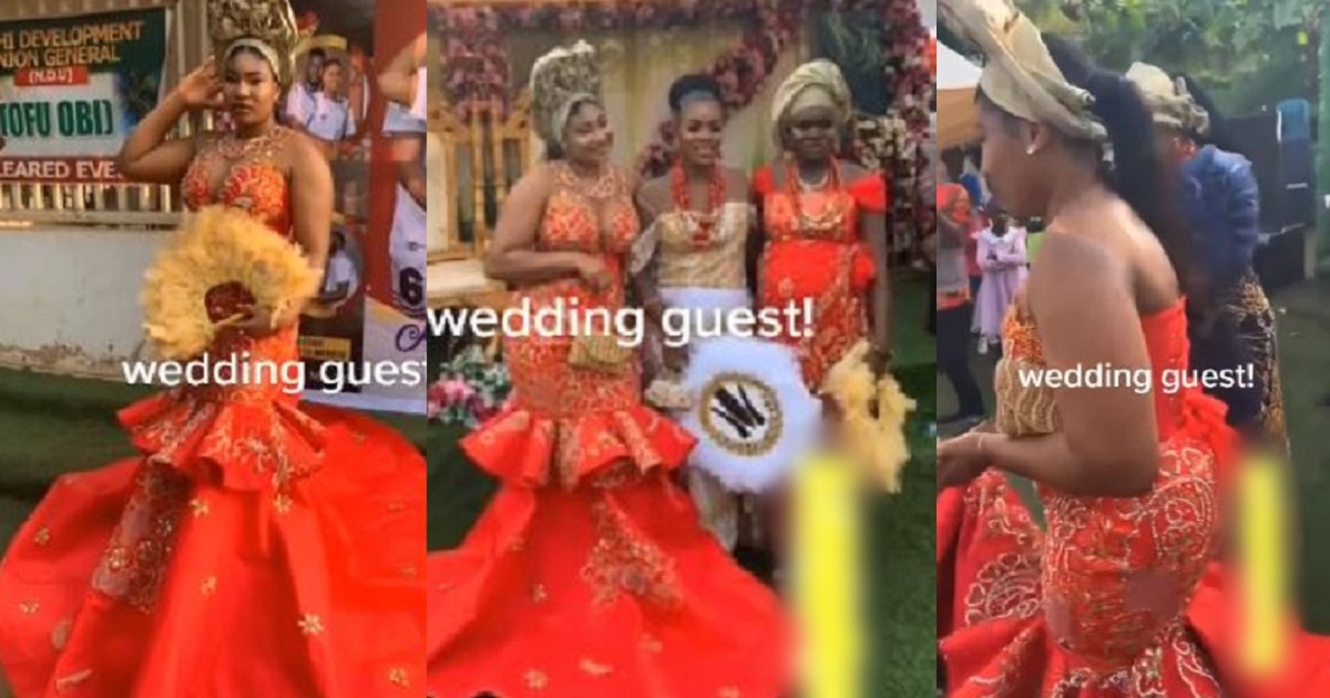 “Deliberate attempt to steal the show from the bride” – Nigerians react to a lady’s outfit to a wedding she was a guest at (video)