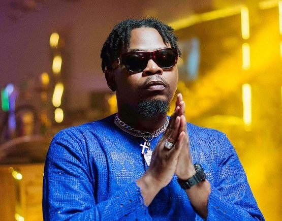 Rapper, Olamide gifts new car to man he slammed for ‘begging’ on Twitter months ago 3 olamide e1644124495406