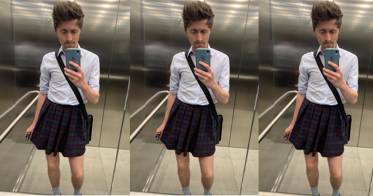 Male employee wears short skirt to work after men were banned from wearing shorts despite the summer heat