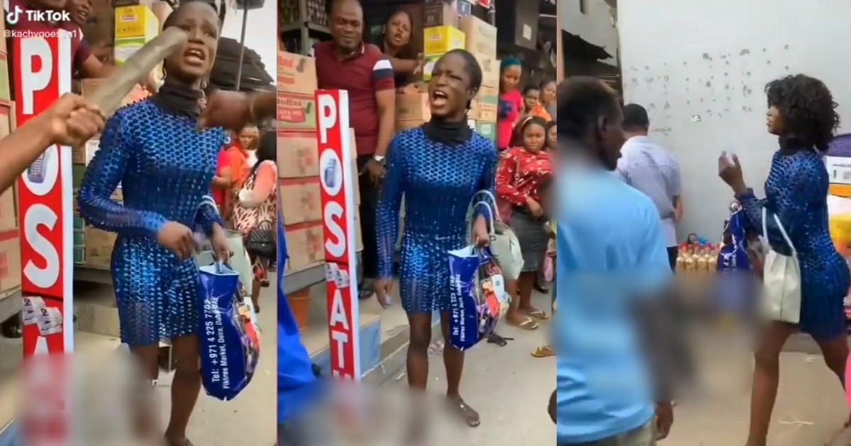 “Are you feeding me?” – Crossdresser confront market men who harassed him for dressing like a lady (Video)