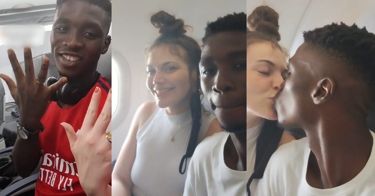 Young Nigerian man flaunts his wedding ring while flying out with white wife (Video)