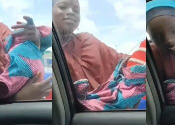 Girl is exposed for using a ‘fake baby’ to beg in Lagos Traffic. (video)