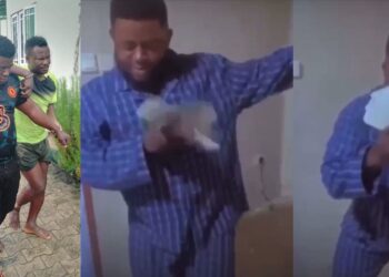 Video of arrested kidnap kingpin John Ewa flaunting wads of cash surfaces (Watch)