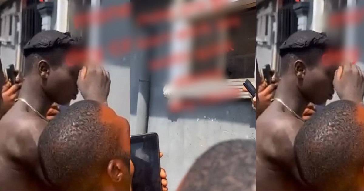 Young man nabbed while allegedly trying to steal panties from a bathroom window (Video)