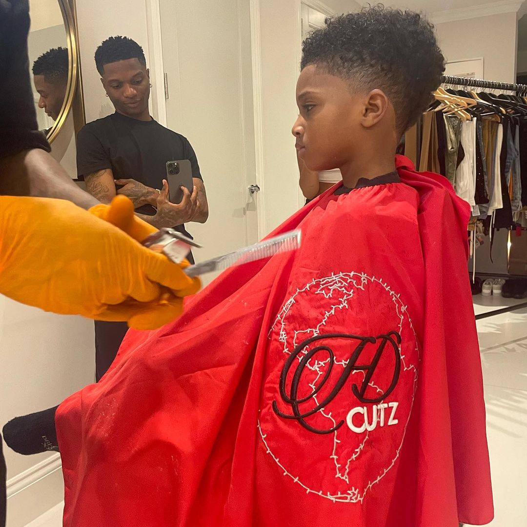 Moment Wizkid took his 4-year-old son, Zion to barbershop for his first hair cut (Video) 4 310848580 1460491101100867 811940847496250120 n