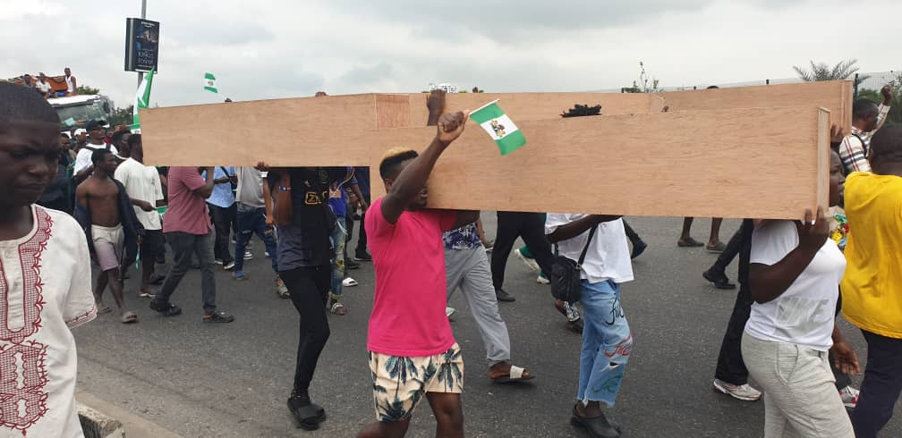 #EndSARS memorial: Falz, Mr Macaroni join youths as they march with dummy coffins at Lekki Tollgate (Photos/Video) 5 63512427ec5e2