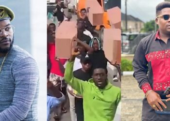 #EndSARS memorial: Falz, Mr Macaroni join youths as they march with dummy coffins at Lekki Tollgate (Photos/Video)