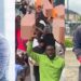 #EndSARS memorial: Falz, Mr Macaroni join youths as they march with dummy coffins at Lekki Tollgate (Photos/Video)