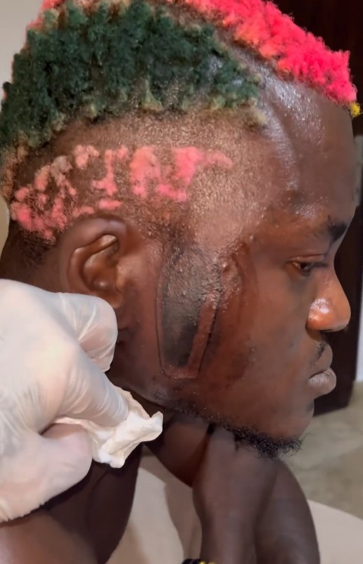 Singer, Portable stirs reactions as he gets coffin tattoo and others on his face (VIDEO) 3 Portable tattoo