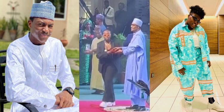 “Orobo with zero sense” – DSS DG’s son slams Teni for not bowing to President Buhari while receiving national award (Video)