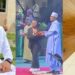 “Orobo with zero sense” – DSS DG’s son slams Teni for not bowing to President Buhari while receiving national award (Video)