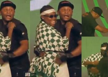 Moment singer Teni invited a shy cameraman on stage to dance with him (Video) 