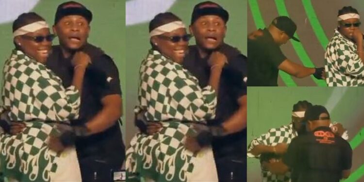 Moment singer Teni invited a shy cameraman on stage to dance with him (Video)